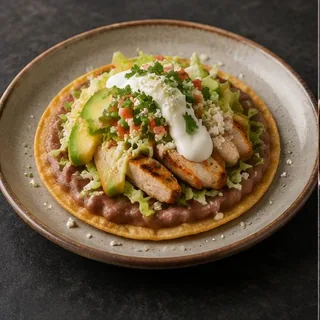 Tostada — AI-generated representative photos — not photographs of Eduar2’s actual dishes.